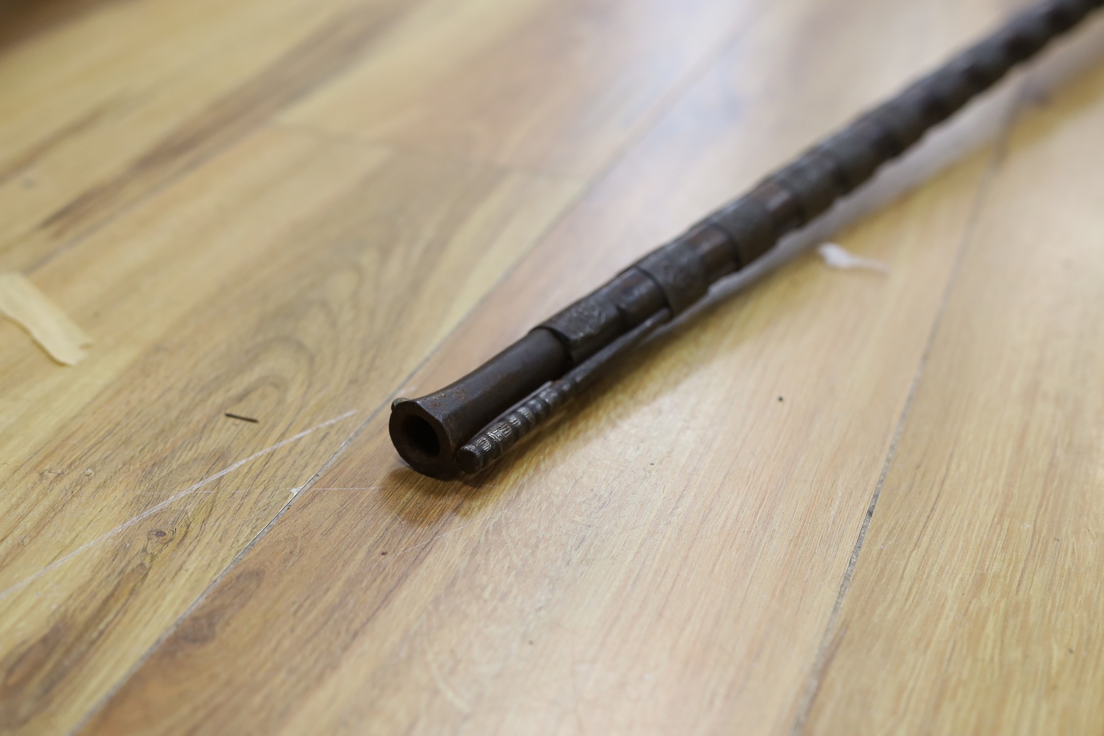 An Eastern antique flintlock rifle - 152cm long